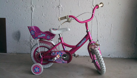 A pink and frilly bike
