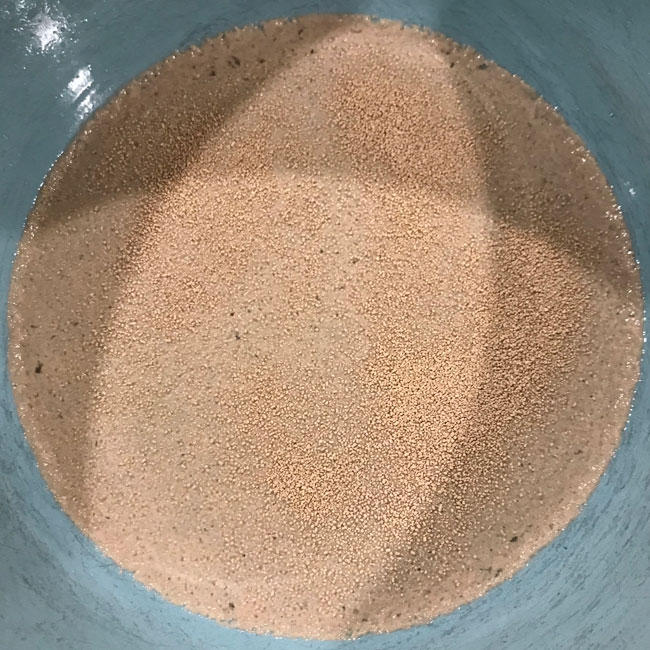 Fresh yeast that's been sprinkled into the bowl
